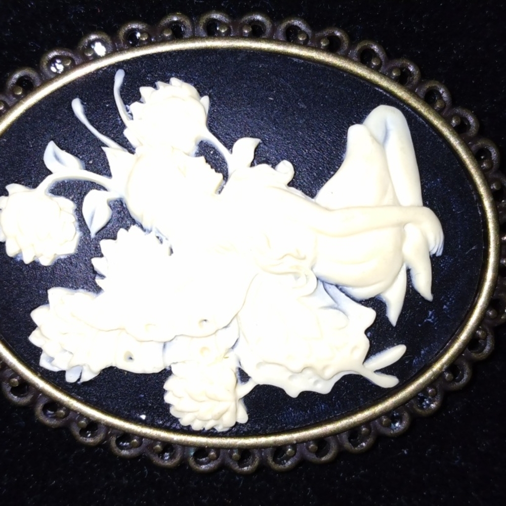 New fairy cameo with long brassy look chain and new braclet